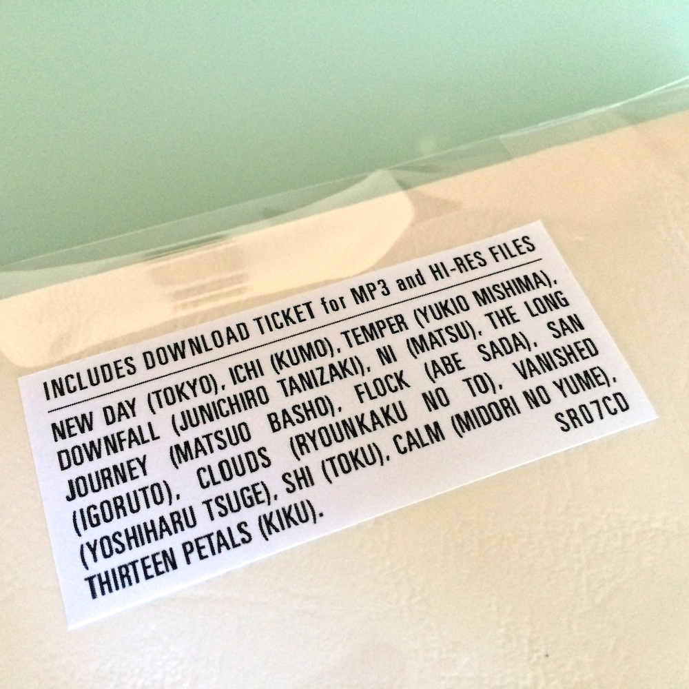 04 Back Sleeve (sticker detail).jpg